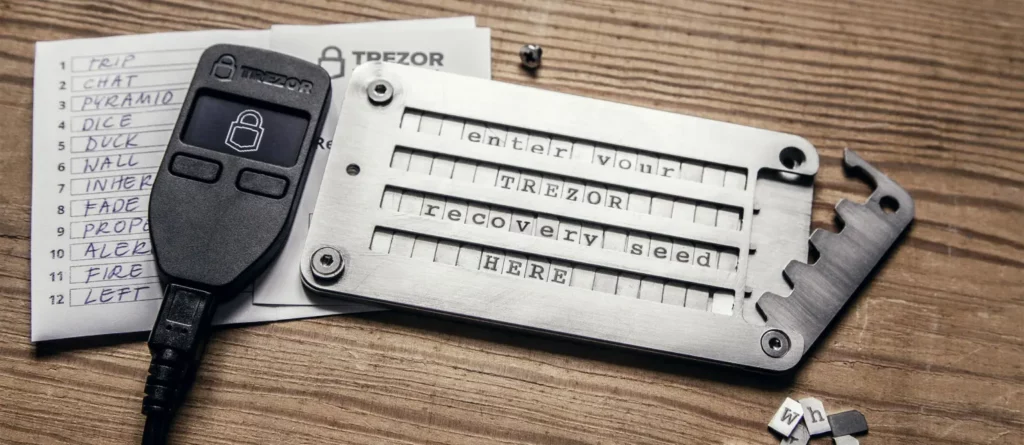 An early Cryptosteel prototype presented to SatoshiLabs in 2014 – and a Trezor One
